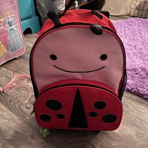 Skip hop ladybug kids luggage.